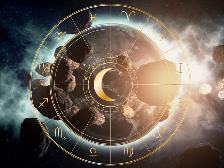 Illustration eines astrologischen Tierkreises mit goldenen Symbolen der zwölf Sternzeichen, die sich kreisförmig um ein zentrales Mond-Symbol anordnen. Im Hintergrund sind zahlreiche Asteroiden zu sehen, die durch den Weltraum treiben, begleitet von leuchtenden Nebeln und kosmischem Licht. Die Szene vermittelt eine Verbindung zwischen Astrologie und der Bewegung von Himmelskörpern wie Ceres, Pallas, Vesta und Juno im Asteroidengürtel.