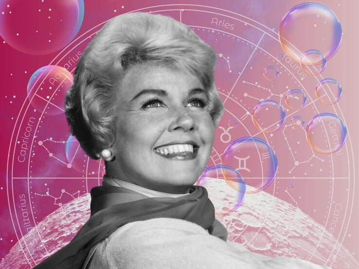 Die Schauspielerin Doris Day in schwarz-weiß steht strahlend vor einem Hintergrund, der das Universum und seine Sterne zeigt und einem Tierkreis mit den Symbolen der 12 Sternzeichen. Neben ihnen sind Seifenblasen zu sehen. Das Bild macht einen mystischen Eindruck.