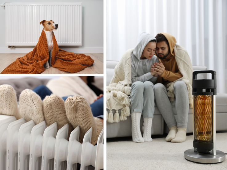 Junge Frau und Mann sitzen in Wollsocken und Decken gehüllt vor Heizstrahler, Hände wärmend, daneben Hund in Decke vorm Radiator.