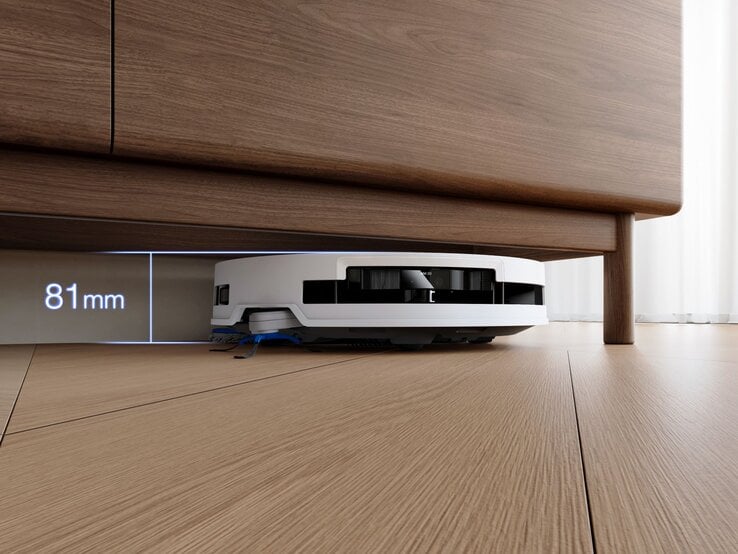  DEEBOT T50 OMNI Gen2 unter einem Schrank. | © ECOVACS