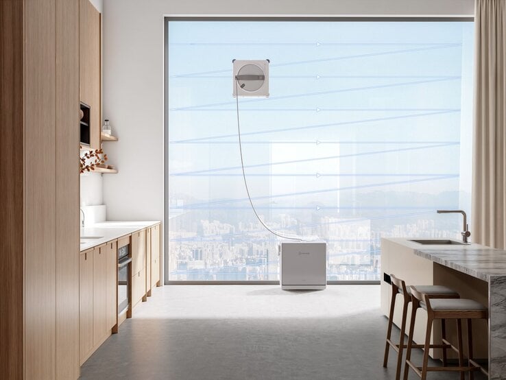  WINBOT W2S OMNI an einer Fensterscheibe im Einsatz. | © ECOVACS